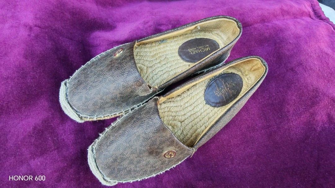 Michael Kors Brown shoes (Category: Sneakers & Footwear) located in Trece Martires City. Submitted by joannequin50934 (Listing ID 1471015828, Image 1). Description: - Authentic Michael Kors slip-on espadrilles in iconic brown monogram print - Classic jute rope trim along the midsole for a stylish summer look - Comfortable flats, ideal for casual everyday wear and travel.