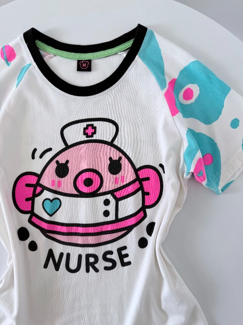 Milki Nurse y2k shirt (Category: Shirts) located in Cabanatuan. Submitted by argarments.ph (Listing ID 1470952542, Image 3). Description: Tagged: Medium on tag Width 17.5" | Length 23.5" Condition: Great condition Issue(s): -.