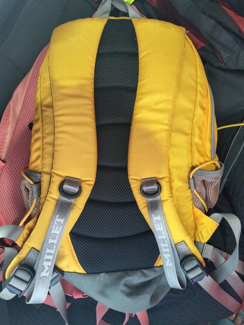 Millet Yellow Hiking Backpack (Category: Hiking & Camping) located in Abucay. Submitted by cristineca20489 (Listing ID 1470955581, Image 2). Description: - Brand: Millet - Color: Bright yellow with stylish grey accents - Storage: Front zippered pocket, main compartment, and internal zip mesh pocket - Convenience: Dual mesh side pockets for water bottles or essentials - Comfort: Padded mesh back panel and fully adjustable shoulder straps - Perfect