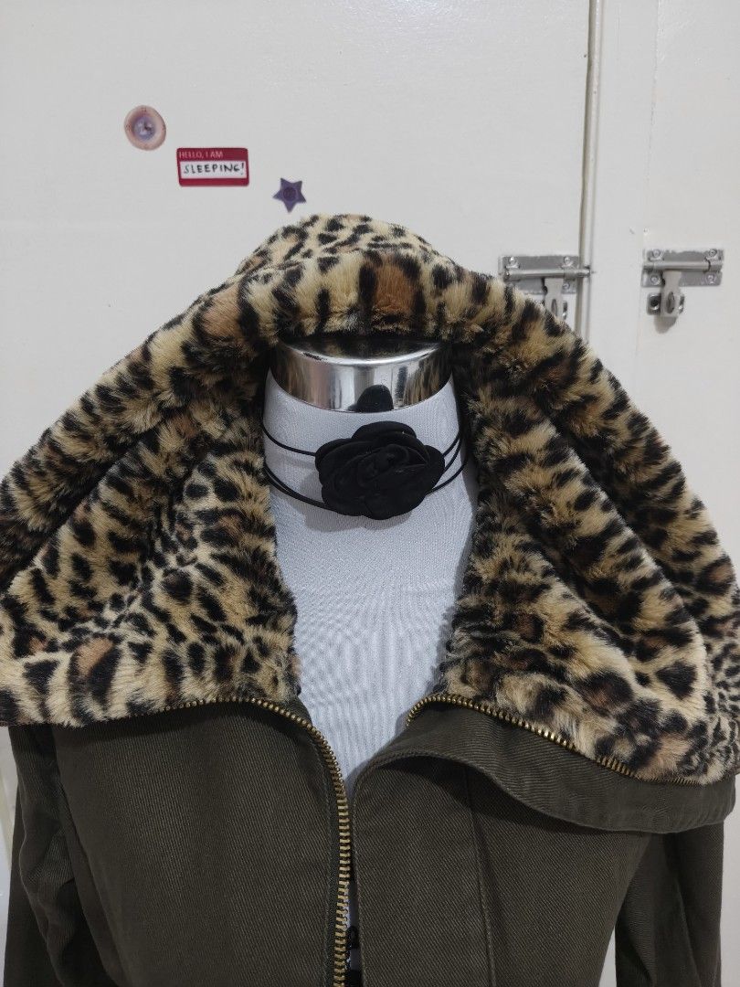 Mini Cream Leopard Fur Parka (Category: Coats, Jackets and Outerwear) located in Pasay City. Submitted by leslies_mystic_finds (Listing ID 1470991068, Image 3). Description: Statement alert! Olive green parka with luxurious leopard-print faux fur on the hood and cuffs. Streetwear favorite — warm, stylish, and so unique 🤎 📏 Size S Can ship through JNT and Tiktok Checkout.