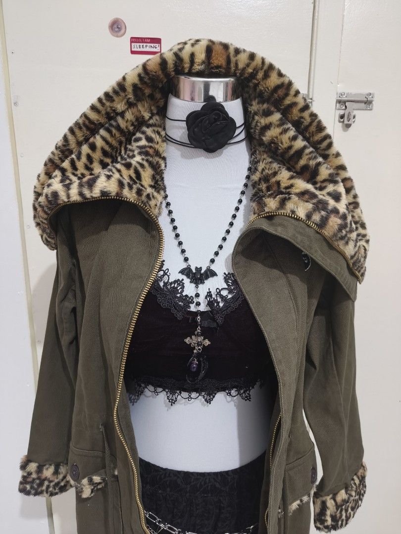 Mini Cream Leopard Fur Parka (Category: Coats, Jackets and Outerwear) located in Pasay City. Submitted by leslies_mystic_finds (Listing ID 1470991068, Image 2). Description: Statement alert! Olive green parka with luxurious leopard-print faux fur on the hood and cuffs. Streetwear favorite — warm, stylish, and so unique 🤎 📏 Size S Can ship through JNT and Tiktok Checkout.