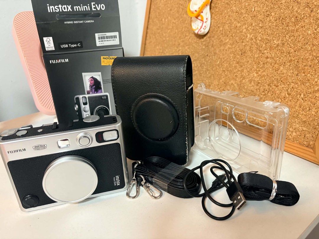 Mini Evo Instax Hybrid Camera (Category: Cameras) located in Buenavista. Submitted by ems_canete (Listing ID 1471056755, Image 2). Description: Once lang nagamit Bought for 13k sa photoline Complete accessories - lens cover - camera bag - screen protector installed since day 1 - clear casing camera.