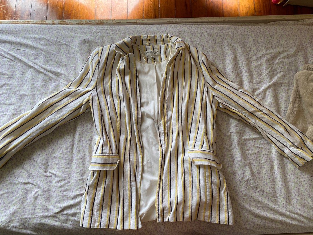 Miss Selfridge Striped Blazer Jacket Size UK 14 (Category: Coats, Jackets and Outerwear) located in Quezon City. Submitted by damclothings.ph (Listing ID 1470953272, Image 1). Description: - Brand: Miss Selfridge - Design: White with yellow, black, and beige vertical stripes - Size: EUR 42, US 10, UK 14 - Details: Fully lined in white, structured shoulders, front pocket flaps - Origin: Made in Vietnam - Style: Great layering piece for smart casua