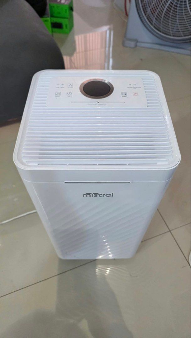 Mistral 12L Dehumidifier White (Category: Air Purifiers & Dehumidifiers) located in Pulilan. Submitted by sebbii (Listing ID 1470964626, Image 1). Description: - Brand: Mistral Dehumidifier (White) - Control Panel: Digital top panel with humidity setting slider, timer, and mode options - Design: Built-in side handle for easy portability - Condition: Clean, working well, includes standard power cord and spec sticker at the back - Benefit: Effectiv