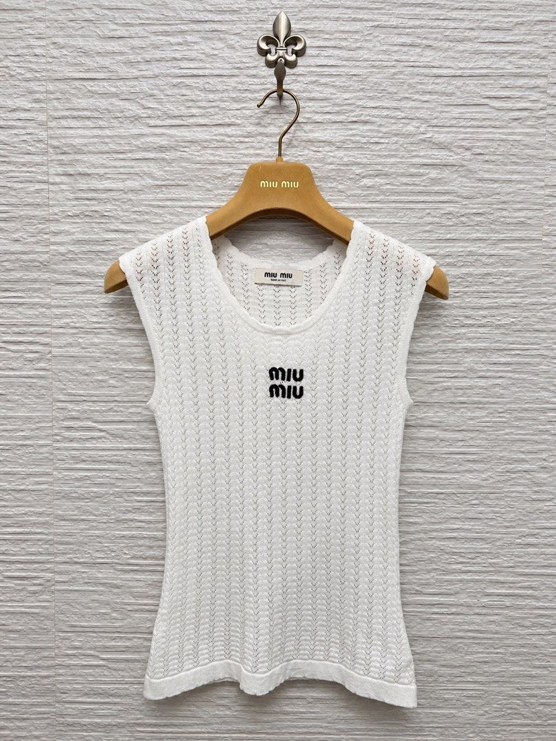 ⚜️Miu Miu knit sleeveless top (Category: Luxury Apparel) located in Makati City. Submitted by 90sangel (Listing ID 1471083835, Image 1). Description: .
