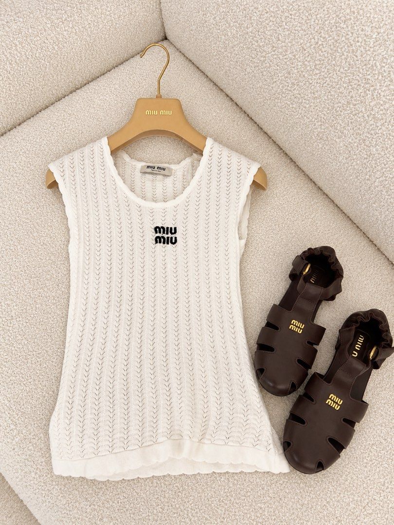 ⚜️Miu Miu knit sleeveless top (Category: Luxury Apparel) located in Makati City. Submitted by 90sangel (Listing ID 1471083835, Image 2). Description: .