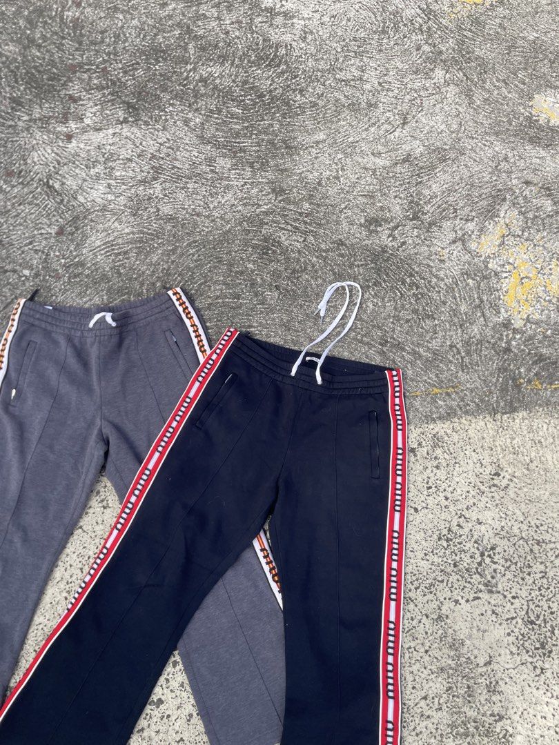 Miu miu striped logo lounge pants(authentic) (Category: Luxury Apparel) located in Alegria. Submitted by deniseeee.21 (Listing ID 1470939395, Image 2). Description: size 44 both womens like new condition Authenticity Guaranteed 100% authentic and fully inspected. Photos show the exact item you will receive 12k bundle.