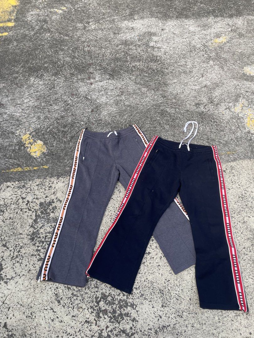 Miu miu striped logo lounge pants(authentic) (Category: Luxury Apparel) located in Alegria. Submitted by deniseeee.21 (Listing ID 1470939395, Image 1). Description: size 44 both womens like new condition Authenticity Guaranteed 100% authentic and fully inspected. Photos show the exact item you will receive 12k bundle.