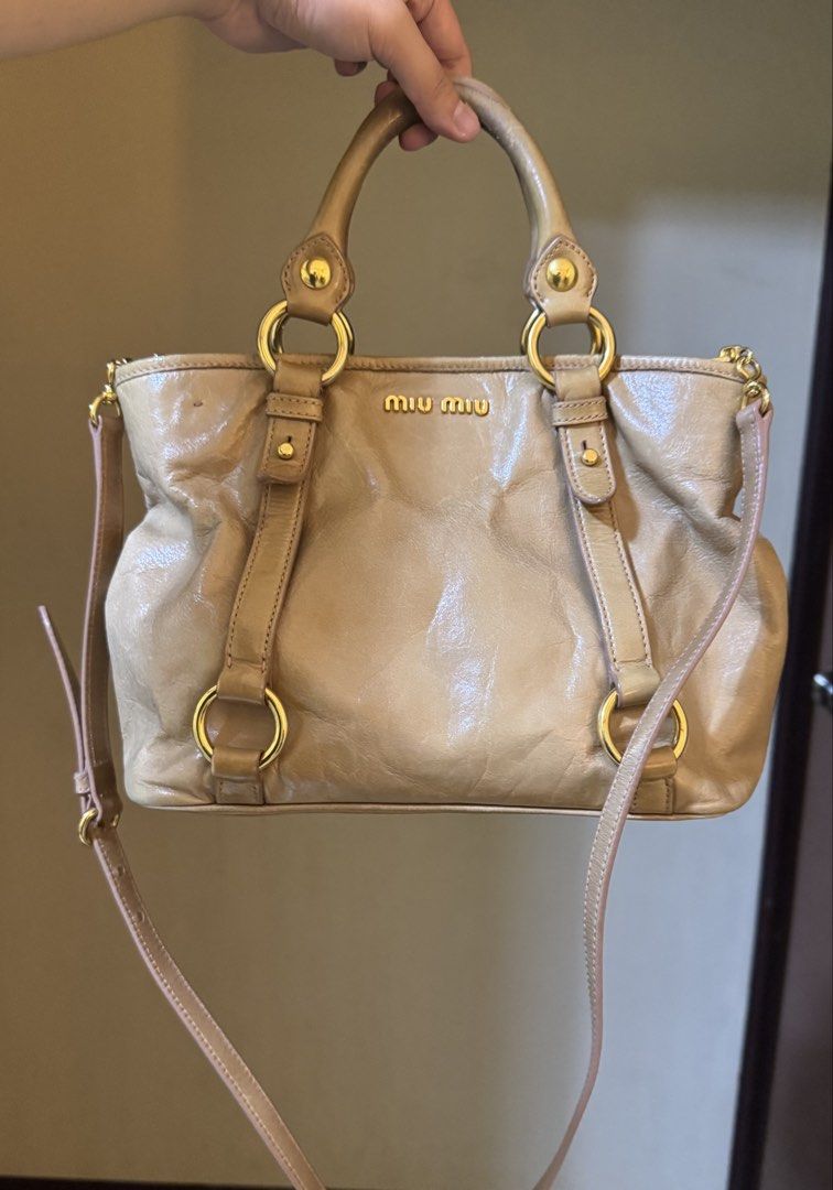 Miu Miu Vitello Two-Way Satchel Bag (Category: Luxury Bags & Wallets) located in Mandaluyong City. Submitted by yumbougieee (Listing ID 1471063533, Image 1). Description: Rank A condition. Pre owned Lightly used, no major flaws Authentic. With Orig dust bag No leather cracks 16k Helping a friend.