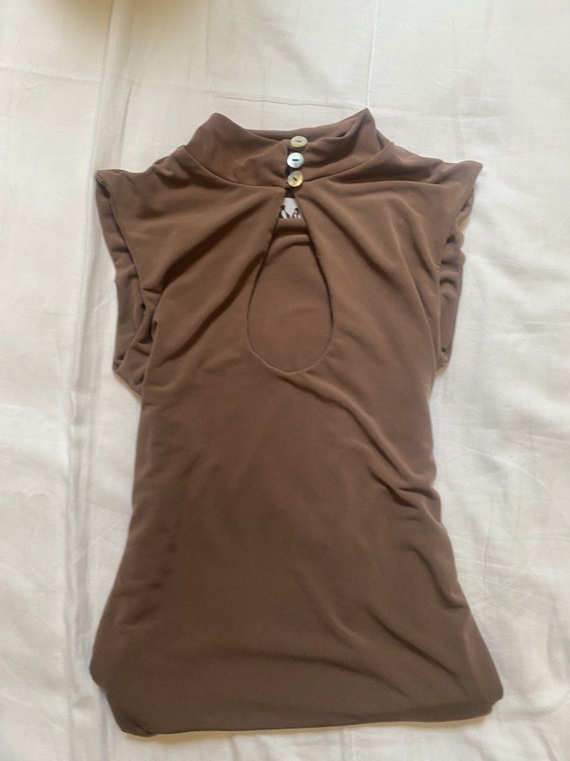 Miu the Label Brown Going Out Top (Category: Sleeveless) located in Taguig. Submitted by g1rlw0rld (Listing ID 1470957940, Image 1). Description: - bought for 1500, selling for 900 - bnew wo tag - fits xs-s.