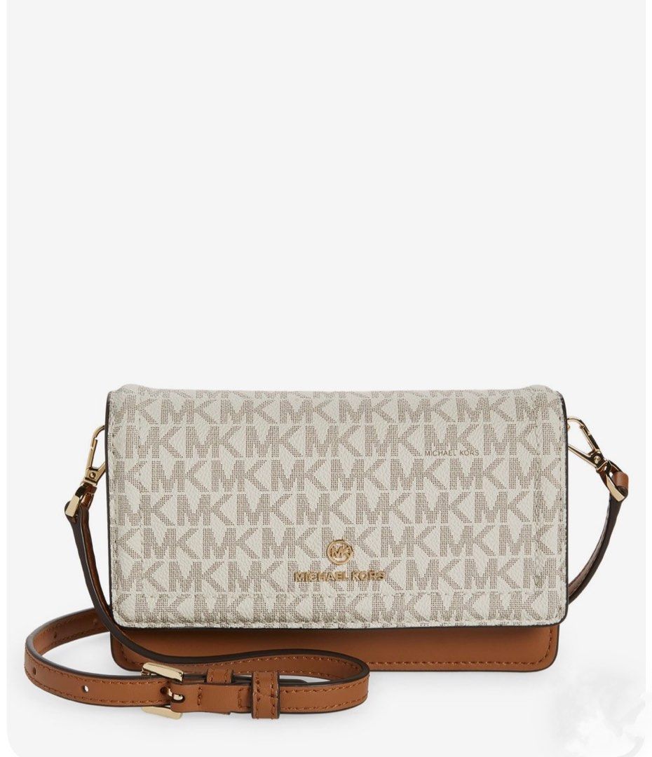 MK Jet Set Charm (Category: Cross-body Bags) located in Manila. Submitted by declutter_time25 (Listing ID 1470991863, Image 1). Description: Jet Set Charm bought it for 198$ selling now half the price of it.