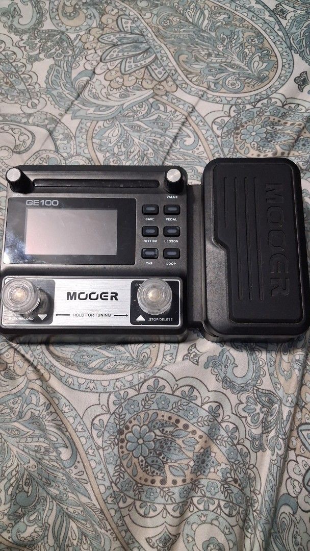 Moor GE100 Guitar Multi Effects Pedal (Category: Musical Instruments) located in Manila. Submitted by warmtree_6c8201 (Listing ID 1471028204, Image 1). Description: - Brand: Moor GE100 multi-effects processor for electric guitar - Compact black housing designed to fit easily on any pedalboard - Built-in expression pedal for dynamic tone control - Clear center LCD screen for easy navigation and patch viewing - Equipped with dual footswitches and m