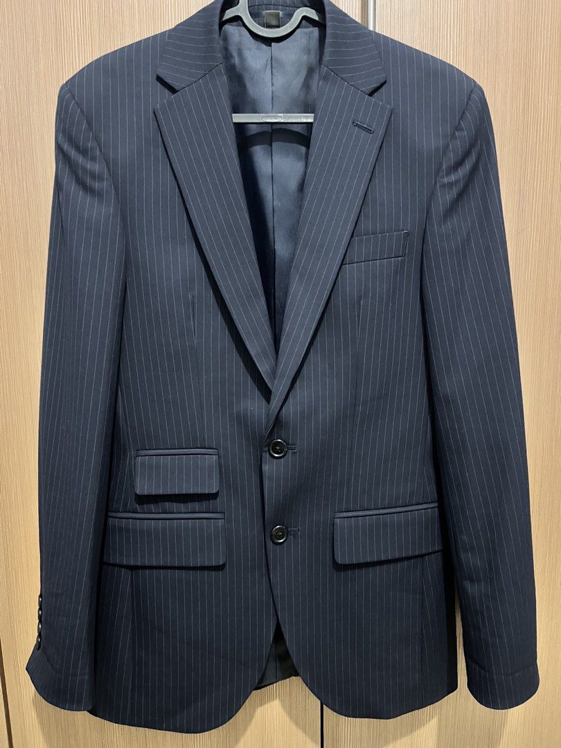 M&S Navy Blue Pinstripe Suit Jacket Blazer (Category: Coats, Jackets and Outerwear) located in Quezon City. Submitted by vwfndrskprs (Listing ID 1471024991, Image 2). Description: Marks & Spencer From the menswear section Size 34 regular Fits M-L women Fits S men Manual measurements: 16” shoulders 18” chest / 36” bust 34” waist 29” length 25” sleeves Fully lined With 3 interior pockets No flaws, like new; exterior pockets are still sewn/stitched 
