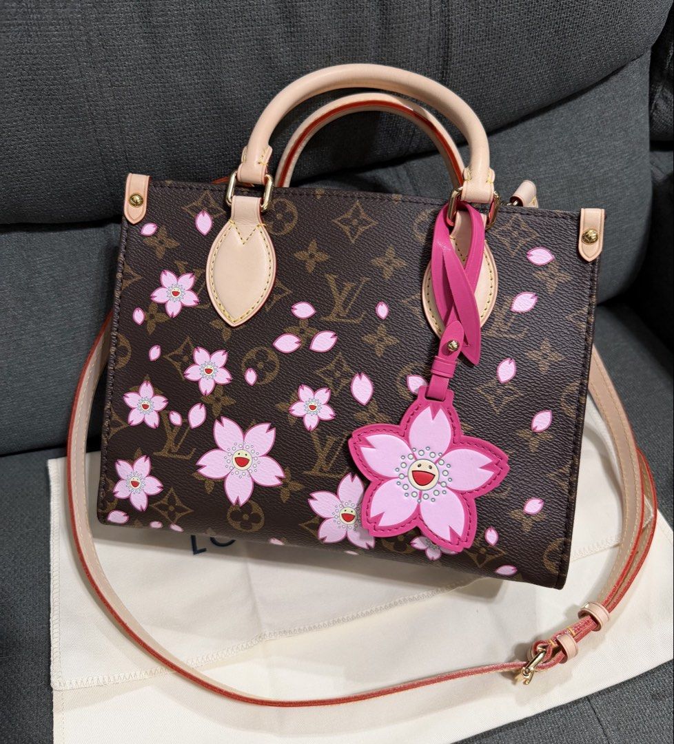 Murakami OnTheGo PM Cherry Blossom Sakura (Category: Cross-body Bags) located in Quezon City. Submitted by chic.bags (Listing ID 1471019983, Image 2). Description: Coded Scannable Woth sling With hang tag With dust bag Good as new No issue Actual photo posted Japan preloved Mop: gcash.