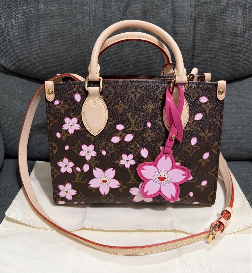 Murakami OnTheGo PM Cherry Blossom Sakura (Category: Cross-body Bags) located in Quezon City. Submitted by chic.bags (Listing ID 1471019983, Image 1). Description: Coded Scannable Woth sling With hang tag With dust bag Good as new No issue Actual photo posted Japan preloved Mop: gcash.