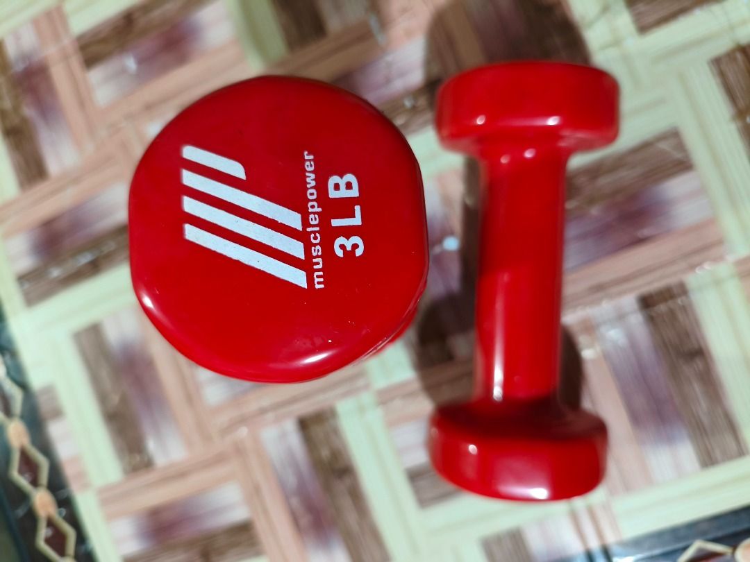 Musclepower 3LB Red Dumbbells Set (Category: Weights & Dumbbells) located in Caloocan City. Submitted by ghoundz (Listing ID 1471083656, Image 1). Description: - Brand/Model: Musclepower dumbbells (Pair) - Weight: 3 lbs each - Color: Bright red coated finish - Features: Solid grip handles for comfortable use - Ideal for: Home workouts, aerobics, and light strength training - Condition: Clean, with minimal signs of handling.