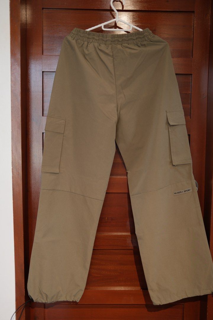 Musera Army Green Cargo Pants (Category: Jeans) located in Makati City. Submitted by nomoreclutterph (Listing ID 1471040176, Image 2). Description: - Brand: Musera - Style: Cargo pants - Color: Khaki brown - Size: XS on tag but fits Small and Medium - Condition: Like new with tags - Features: Elastic waistband with drawstring, side utility pockets, adjustable toggle hem at cuffs.