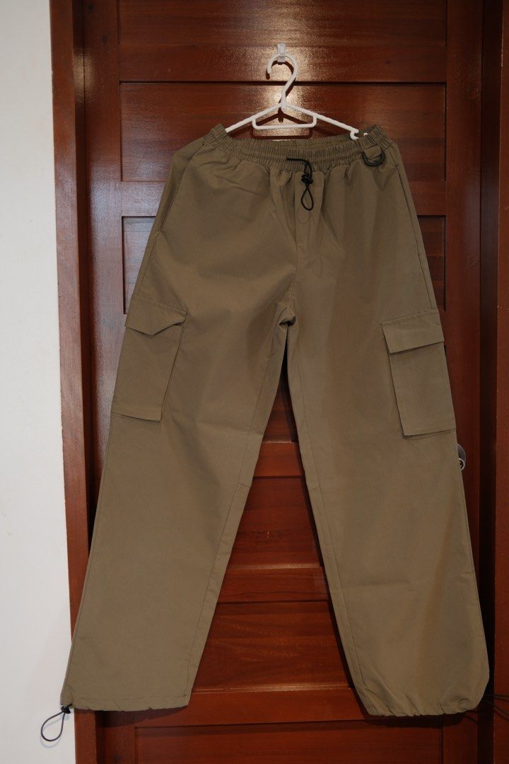 Musera Army Green Cargo Pants (Category: Jeans) located in Makati City. Submitted by nomoreclutterph (Listing ID 1471040176, Image 1). Description: - Brand: Musera - Style: Cargo pants - Color: Khaki brown - Size: XS on tag but fits Small and Medium - Condition: Like new with tags - Features: Elastic waistband with drawstring, side utility pockets, adjustable toggle hem at cuffs.