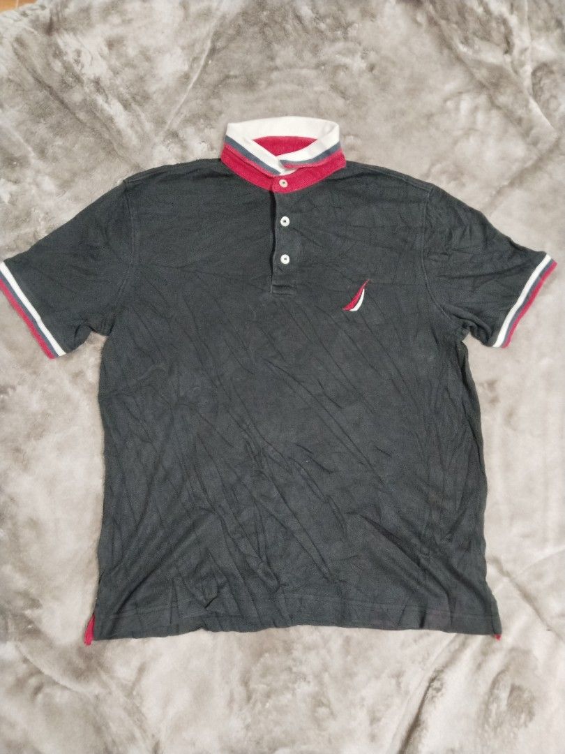Nautica Classic Fit Polo — Size S (Category: Tshirts & Polo Shirts ) located in Mabalacat. Submitted by al_amin_thrift (Listing ID 1471067873, Image 1). Description: Nautica Classic Fit Polo — Size S ✔️ Authentic Nautica — Classic Fit ✔️ Black body with red, white & navy striped collar and cuffs ✔️ Embroidered Nautica sail logo on chest ✔️ 100% cotton — soft & comfortable ✔️ Made in Vietnam ✔️ Good pre-loved condition 🚚 Free shipping included!.