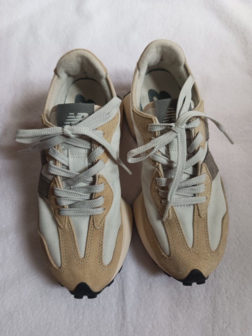 NB 327 women (Category: Sneakers) located in Malabon City. Submitted by mslalan (Listing ID 1470971629, Image 1). Description: - Brand: New Balance 327 - Colorway: Chic Beige and Grey - Size: US Women 6.5 / US Men 5 / UK 4.5 / EU 37.5 (230 MM) - Materials: Premium nylon and suede upper with iconic oversized N logo - Sole: Chunky cushioned midsole and studded rubber outsole extending up the heel - Condition: Clean overall.