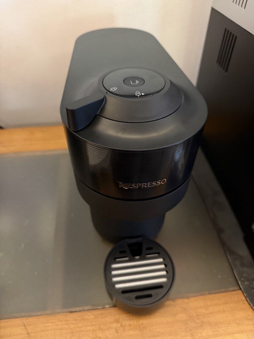 Nespresso Vertuo Pop Coffee Machine Black (Category: Coffee Machines & Makers) located in Makati City. Submitted by genuinelygoods (Listing ID 1470936716, Image 3). Description: -Recently opened (Original box included) Rfs: Small for my coffee needs - Model: Nespresso Vertuo Pop - Color: Classic Black - Versatile brewing: Makes both espressos and larger coffee cups - Space-saving design: Compact size fits easily on small kitchen counters .