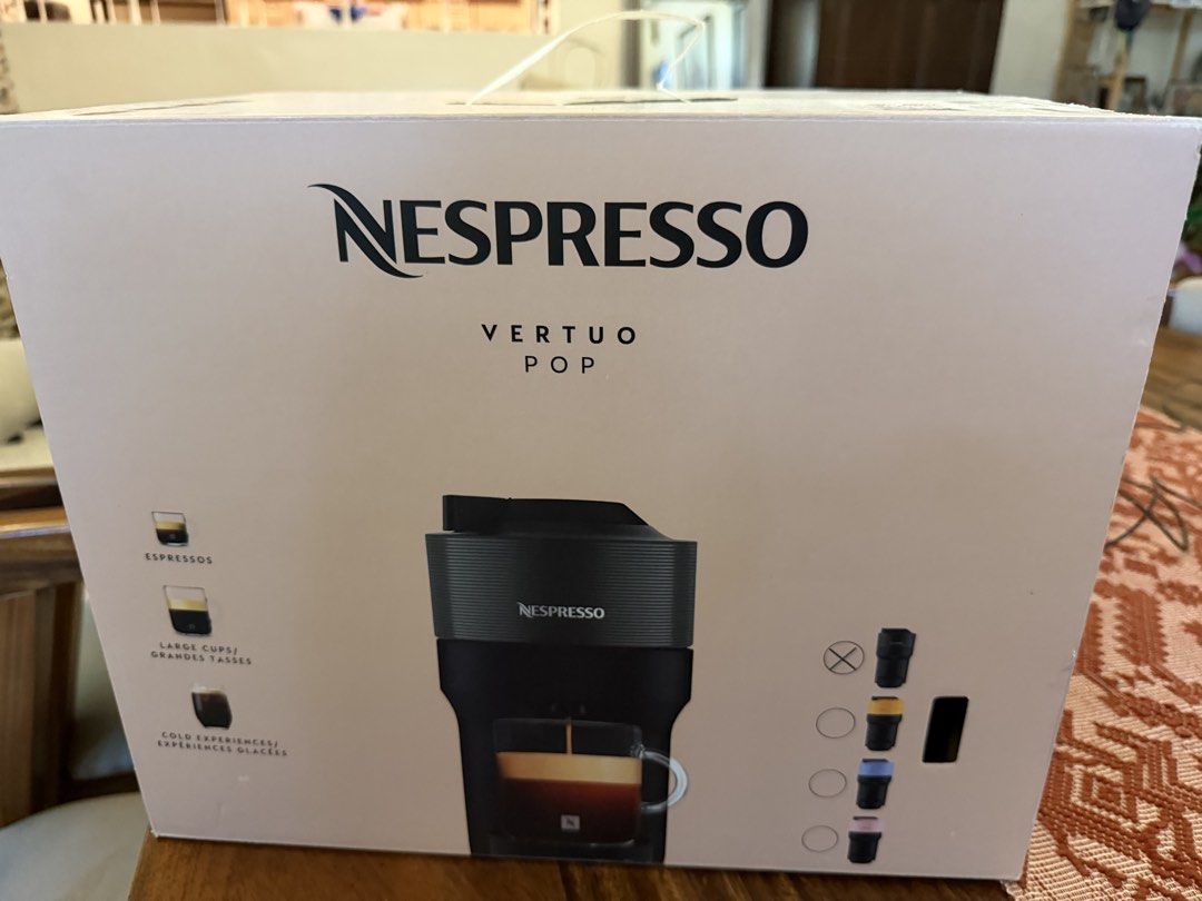 Nespresso Vertuo Pop Coffee Machine Black (Category: Coffee Machines & Makers) located in Makati City. Submitted by genuinelygoods (Listing ID 1470936716, Image 1). Description: -Recently opened (Original box included) Rfs: Small for my coffee needs - Model: Nespresso Vertuo Pop - Color: Classic Black - Versatile brewing: Makes both espressos and larger coffee cups - Space-saving design: Compact size fits easily on small kitchen counters .