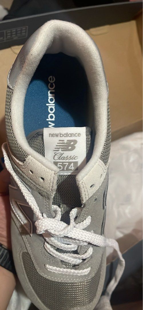 New Balance 574 Classic Gray (Category: Casual Shoes) located in Manila. Submitted by briantafalla_04 (Listing ID 1470988890, Image 2). Description: Never been used (as in sinukat lang talaga pagdating nung item) Will be selling it as the same price from when I bought it (Bought last payday sale sa orange app) RFS: incorrect size (masikip sya sakin 😅😭).