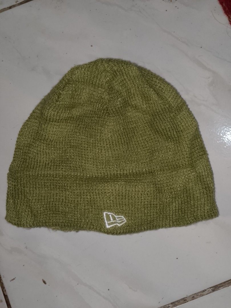 New Era Sprout Green Beanie (Category: Caps & Hats) located in Kapalong. Submitted by aliclothesfinds21 (Listing ID 1471045458, Image 1). Description: - Brand: New Era - Color: Sprout Green - Material: 100% Acrylic (warm and cozy) - Design: Embroidered New Era flag logo on the front - Origin: Made in China - Details: Clean knit fabric, internal tags with product code 12866274 and Oct 2021 mfg date.