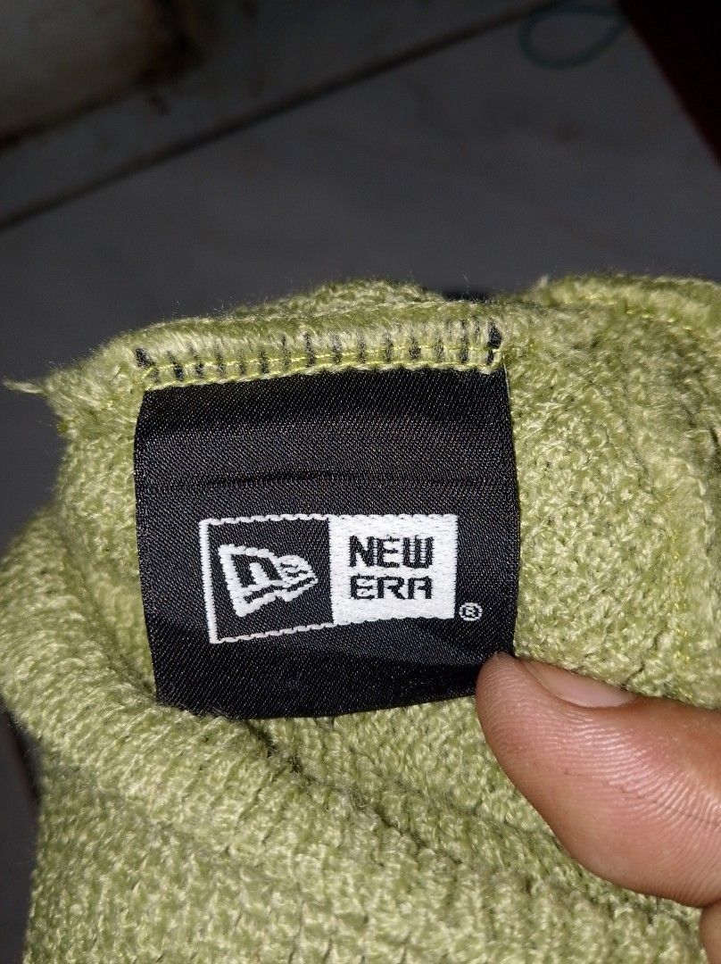 New Era Sprout Green Beanie (Category: Caps & Hats) located in Kapalong. Submitted by aliclothesfinds21 (Listing ID 1471045458, Image 2). Description: - Brand: New Era - Color: Sprout Green - Material: 100% Acrylic (warm and cozy) - Design: Embroidered New Era flag logo on the front - Origin: Made in China - Details: Clean knit fabric, internal tags with product code 12866274 and Oct 2021 mfg date.