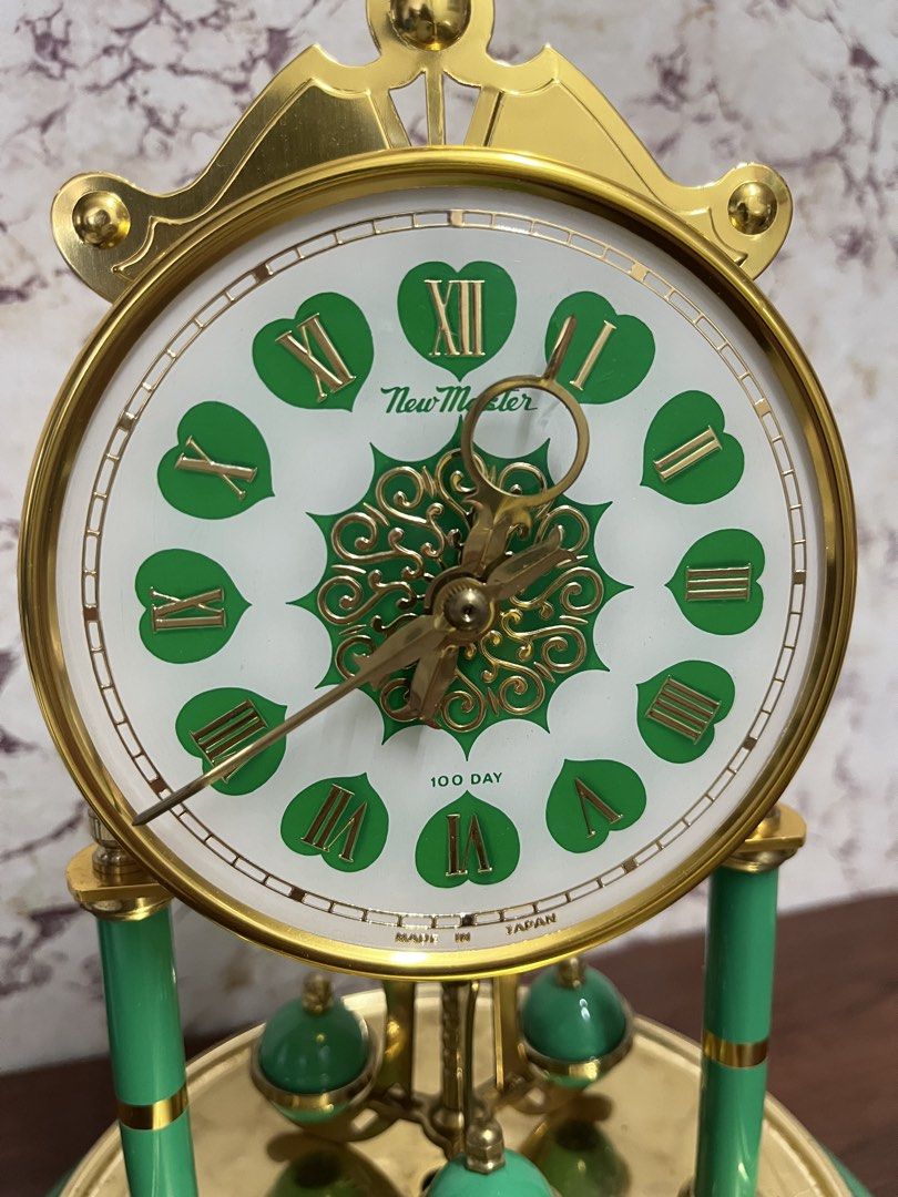 New Master 100 Day Glass Dome Anniversary Clock (Category: Clocks) located in Manila. Submitted by kayerrr.gem (Listing ID 1471073218, Image 3). Description: FOR SALE!!! Vintage Green & Gold 100-Day Pendulum Clock A lovely display piece for vintage collectors and antique enthusiasts! - Elegant green and gold finish - Classic Roman numeral dial - Decorative pendulum and dome design Condition: NOT WORKING / FOR DISPLAY OR RESTORATION (Sold as is.) 