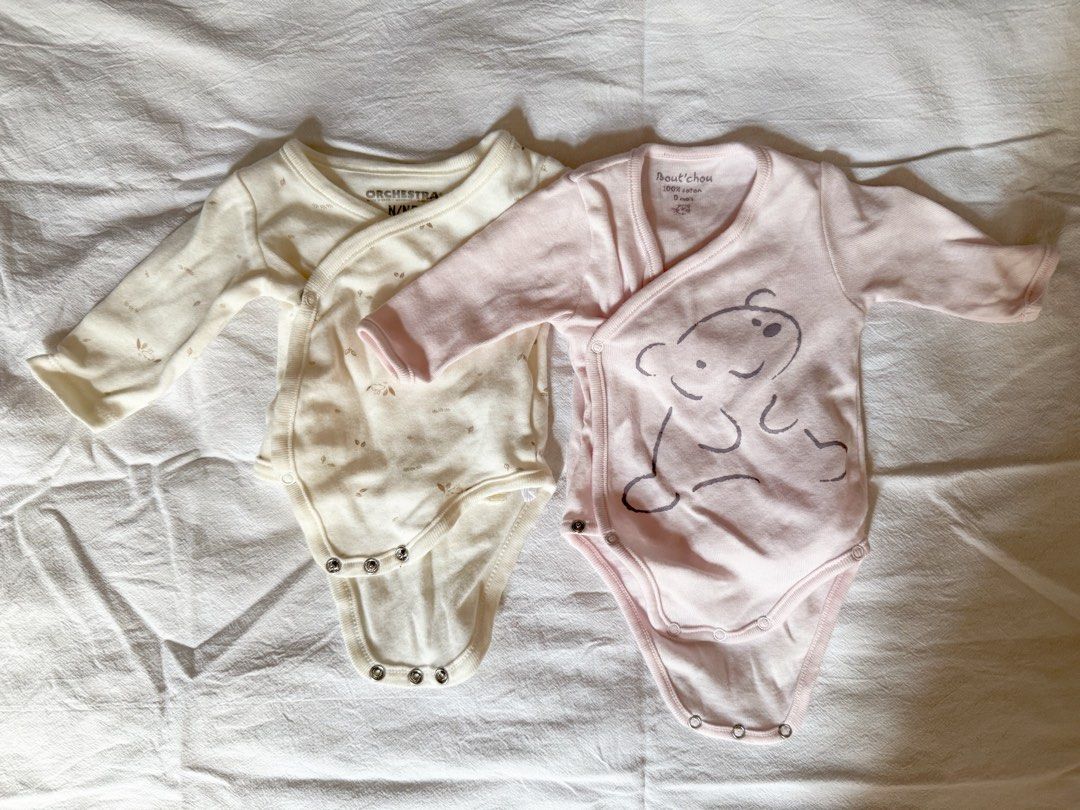 Newborn side snap longsleeves Pack of 2 (Category: Babies & Kids Fashion) located in Pasig City. Submitted by khaleisi (Listing ID 1470974804, Image 1). Description: - Set of 2 newborn long-sleeve bodysuits - Cream bodysuit: Orchestra brand, subtle leaf print, side snaps - Light pink bodysuit: bout'chou brand, bear graphic, 100% cotton, side snaps - Bottom snap closures for quick and easy changes - Soft, gentle fabric ideal for newborns - Care: G