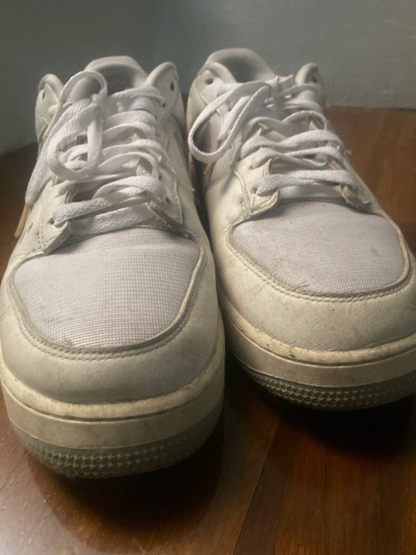 Nike Air Force 1 Platform White Sneakers (Category: Sneakers) located in Manila. Submitted by master02 (Listing ID 1470986629, Image 2). Description: - Brand/Model: Nike Air Force 1 Platform - Color: Classic White - Material: Fabric and leather upper - Closure: Lace-up with white laces - Style: Chunky midsole, perfect for casual streetwear - Condition: Pre-loved with visible dirt marks on midsoles and uppers from previous wear.