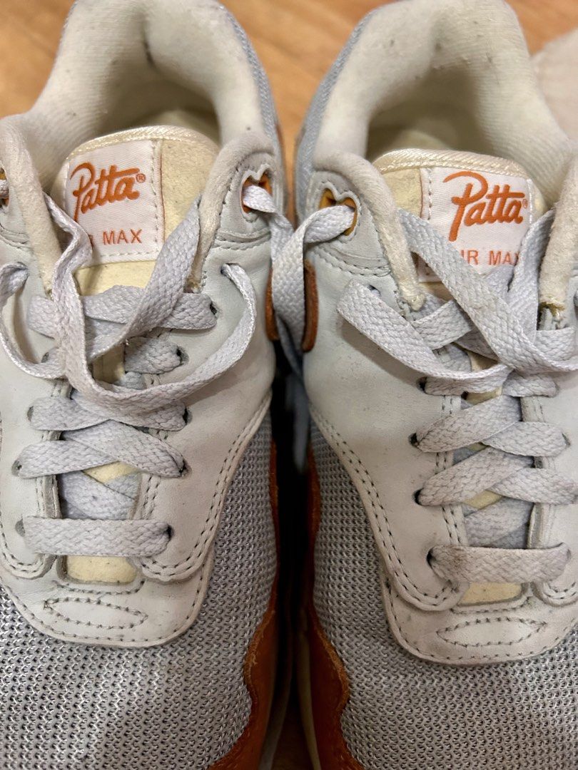 Nike Air Max 1 Patta Monarch Size 7.5 (Category: Sneakers) located in Mandaluyong City. Submitted by kyliekaye (Listing ID 1470934418, Image 1). Description: - Model: Nike Air Max 1 x Patta 'Monarch' - Size: US 7.5 - Colorway: Metallic Silver / White / Burnt Orange - Details: Signature wavy mudguard, Patta tongue branding, and custom insoles - Condition: Worn a few times, minor scuffs on the orange mudguard, and normal toe box creasing - Soles: S