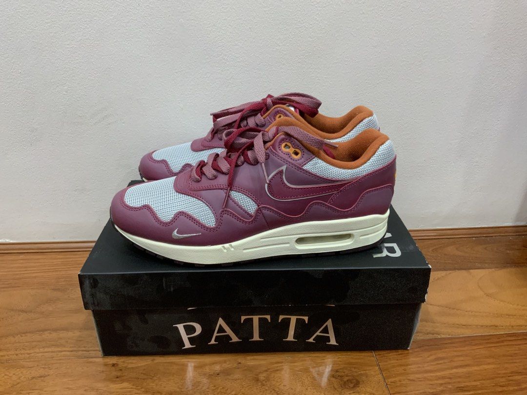 Nike Air Max 1 Patta Rush Maroon (Category: Sneakers) located in Mandaluyong City. Submitted by plaza.esquinita (Listing ID 1471091628, Image 1). Description: - Model: Patta Collaboration Sneakers - Colorway: Metallic Silver and Rush Maroon - Design: Iconic wave mudguard - Size: Men's US 9 / Women's US 10.5 - Condition: Brand new, never worn, pristine condition - Inclusions: Original special edition Patta box included 7,000 pesos only.