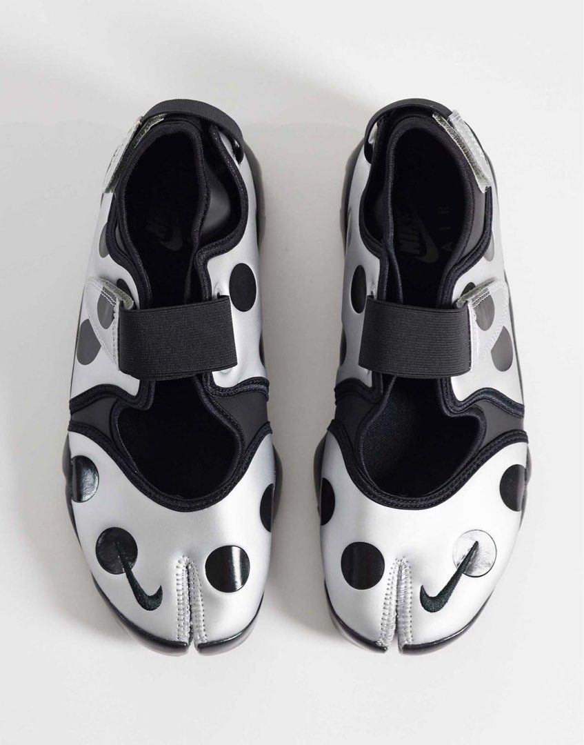 Nike Air Rift Polka Dot Silver Black (Category: Sneakers) located in Mandaluyong City. Submitted by meridaaa (Listing ID 1471085325, Image 1). Description: - Brand: Nike Air Rift - Color: Silver with black polka dots - Design: Iconic split-toe (tabi) silhouette with secure velcro straps - Sole: Chunky black rubber with Nike Air cushioning for extra comfort - Style: Avant-garde, perfect statement piece for your outfit **No box.
