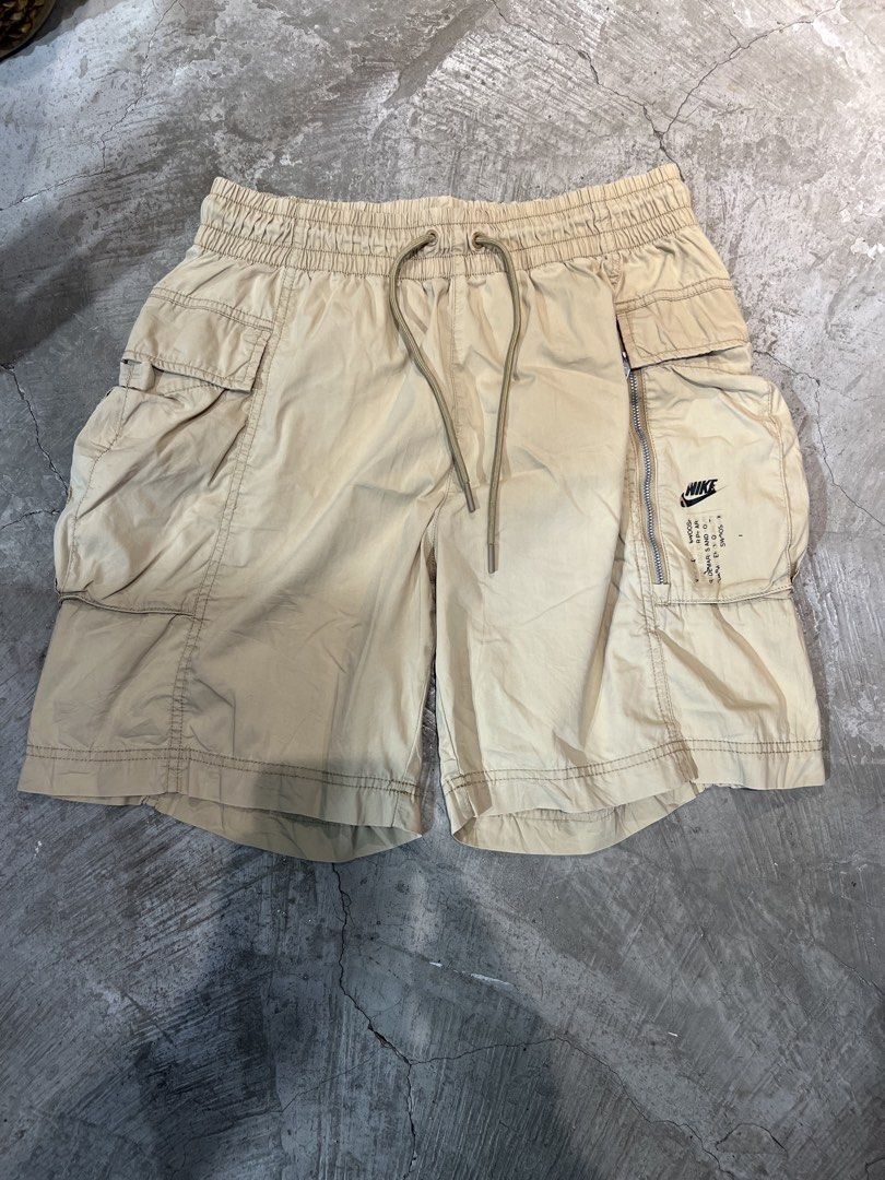 Nike Beige Cargo Parachute Pants (Category: Shorts) located in Manila. Submitted by thriftpoint99 (Listing ID 1471049710, Image 2). Description: 30-36x19x13 Issue print only Excellent condition.