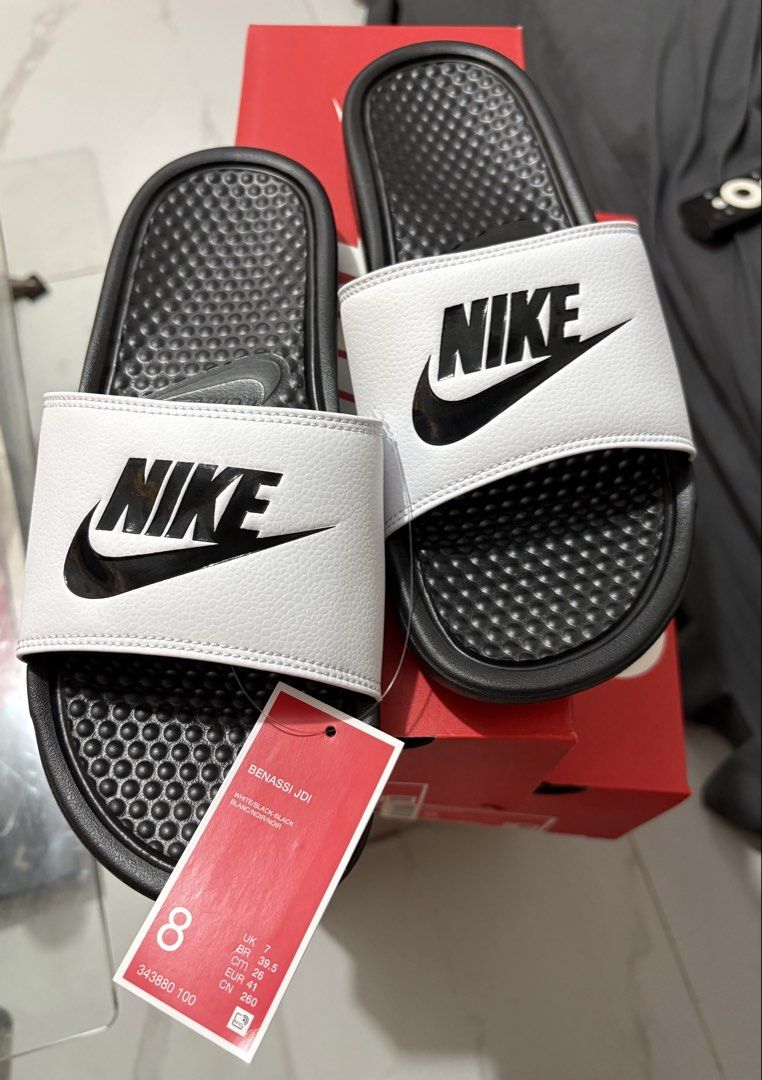 Nike Benassi JDI Men's Slides (Category: Slippers & Slides) located in Manila. Submitted by shoepatos4u (Listing ID 1470944069, Image 3). Description: Mens us8,9,10 available Slide into comfort in the lightweight and sporty Nike Benassi JDI Slide. It features the Nike logo on the foot strap, which is lined in super soft fabric. The foam midsole brings that beach feeling to your feet and adds spring to your kicked-back style. Benefits 1-piece, syn