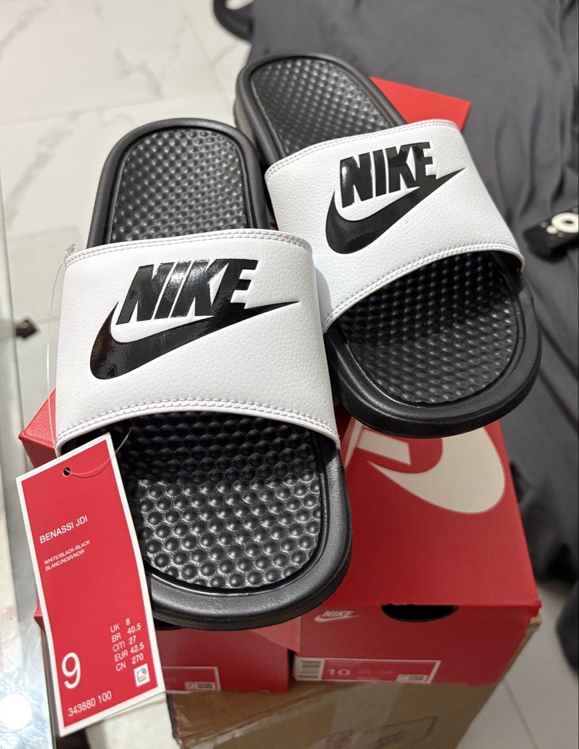 Nike Benassi JDI Men's Slides (Category: Slippers & Slides) located in Manila. Submitted by shoepatos4u (Listing ID 1470944069, Image 1). Description: Mens us8,9,10 available Slide into comfort in the lightweight and sporty Nike Benassi JDI Slide. It features the Nike logo on the foot strap, which is lined in super soft fabric. The foam midsole brings that beach feeling to your feet and adds spring to your kicked-back style. Benefits 1-piece, syn