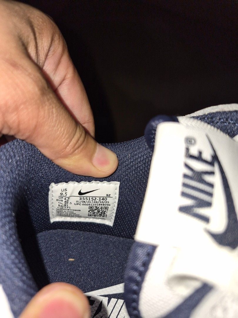 Nike Big Low White Midnight Navy size 9.5 (Category: Sneakers) located in Manila. Submitted by jm1218 (Listing ID 1471051654, Image 1). Description: - Brand: Nike - Colorway: White and Navy Blue - Size: US 9.5 / UK 8.5 / EUR 43 / BR 41 / CM 27.5 - Material: Clean white leather upper with perforated toe box - Design Details: Navy blue accents on tongue tag, collar lining, and outsole - Sole: Classic rubber sole with circular traction pattern - Sty