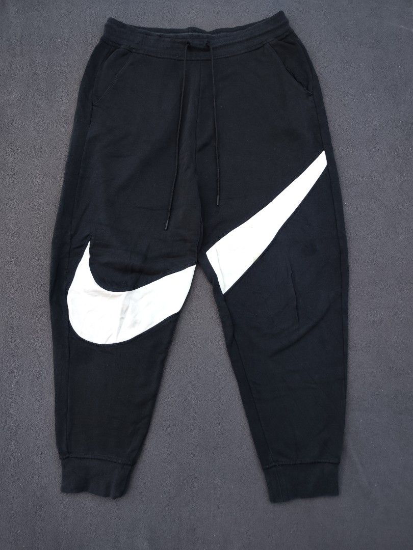 Nike Big Swoosh Jogger (Category: Joggers) located in Bulacan. Submitted by emilj23 (Listing ID 1470967384, Image 1). Description: Nike Big Swoosh Jogger Size XL on tag L 36.5 W 32-36 Leg Hole 5 Condition 9/10 Color rate 9/10 Issue Minimal Stains.