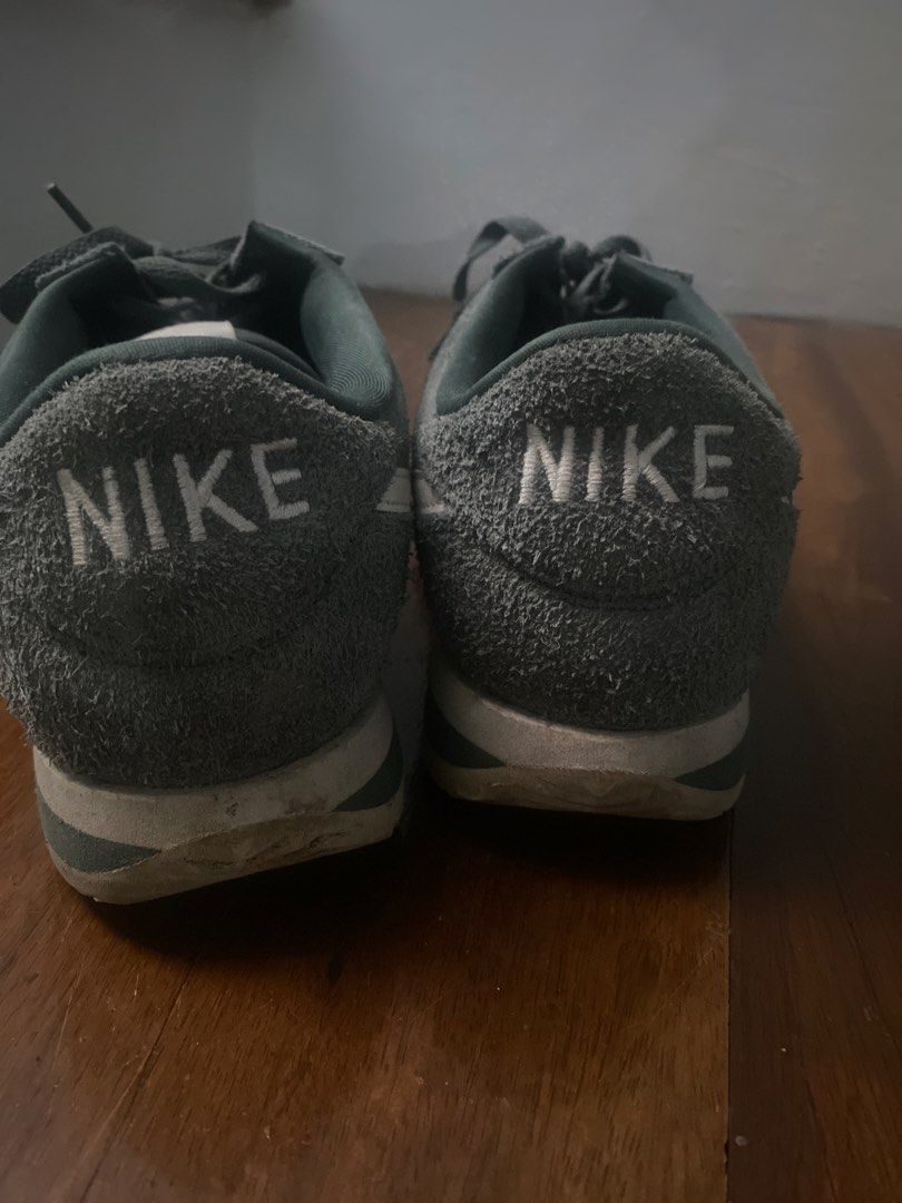 Nike Cortez Suede Green Sneakers (Category: Sneakers) located in Manila. Submitted by master02 (Listing ID 1470986042, Image 3). Description: - Brand: Nike - Model: Cortez Retro Runner - Color: Green Suede with White Swoosh and Laces - Details: Embroidered text logo on heel tabs, original tongue tags intact - Condition: Uppers in great textured suede condition; rubber outsole has minor dirt marks from light wear.