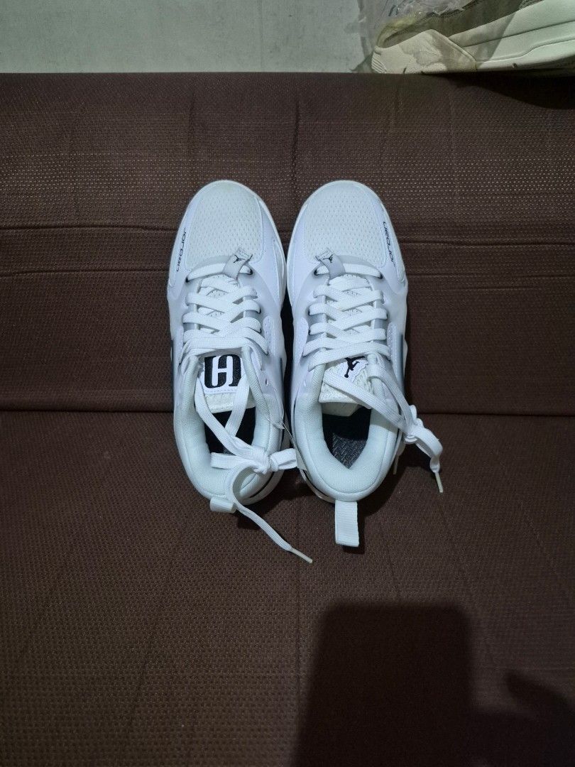 Nike Jordan White Sneakers Size US 6.5 (Category: Sneakers) located in Manila. Submitted by jm1218 (Listing ID 1471045835, Image 1). Description: - Brand: Nike Jordan - Color: Crisp White - Size: US 6.5 / EUR 37.5 - Condition: Fresh out of the box, zero wear on tread - Features: Classic hoops design, iconic Jumpman branding, and comfortable padded collar.
