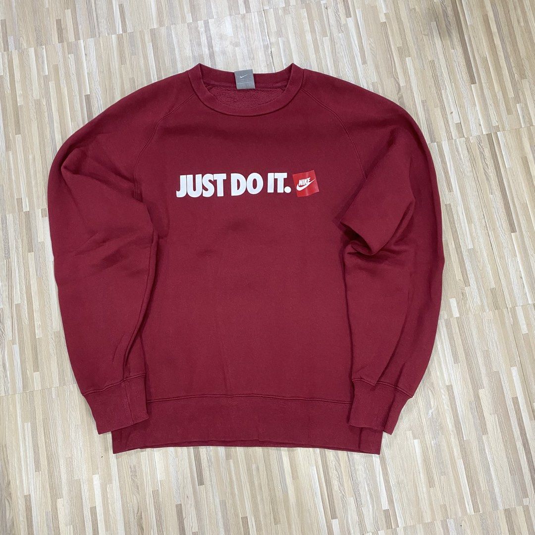 Nike Just Do It Red Sweatshirt (Category: Coats, Jackets and Outerwear) located in Manila. Submitted by scapethrift (Listing ID 1470977125, Image 1). Description: - Brand: Nike - Color: Maroon with white 'Just Do It' text and red box logo - Size: Large - Condition: Great pre-loved condition - Features: Ribbed cuffs and hem for a snug fit - Origin: Made in China - Mode of Payment: GCash, BPI, or COD via shipping - Shipping: Via J&T Express or Lala