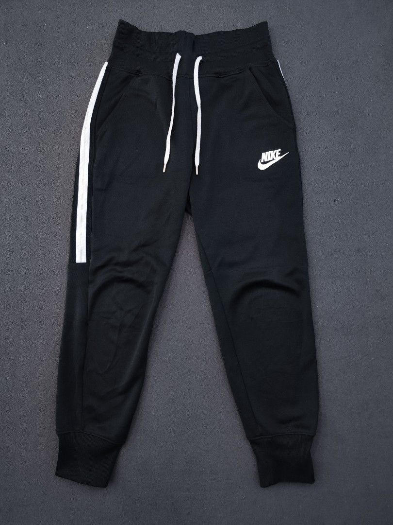 Nike NSW Womens PK Track Joggers (Category: Other Bottoms) located in Bulacan. Submitted by emilj23 (Listing ID 1470972762, Image 1). Description: Nike NSW Womens PK Track Joggers Size M on tag L 36 W 26-34 Leg Hole 4 Condition 9.5/10 Color rate 9.5/10 No Issue.