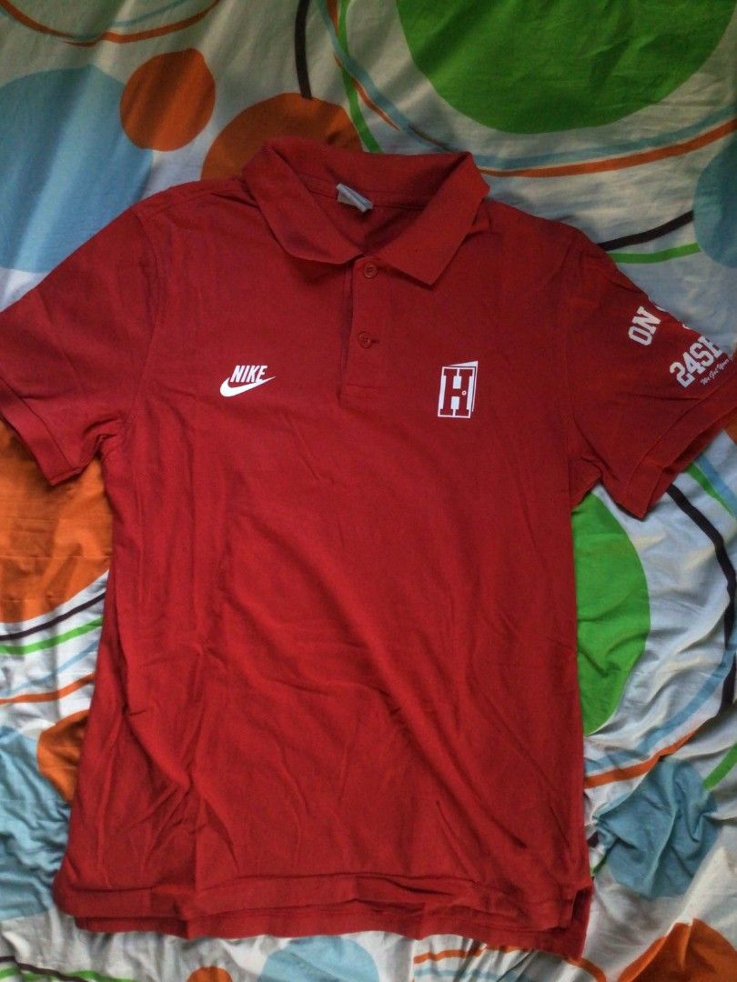 Nike Polo Shirt (Category: Tshirts & Polo Shirts ) located in General Trias. Submitted by dunht (Listing ID 1471082253, Image 1). Description: - Brand: Nike Sportswear - Item: Red Polo Shirt - Size: L - Material: 100% Cotton - Details: White Nike logo on chest, 'SECURITY' text with number 72 and keys graphic on the back - Condition/Extras: Includes extra button on inner care tag - Origin: Made in China.