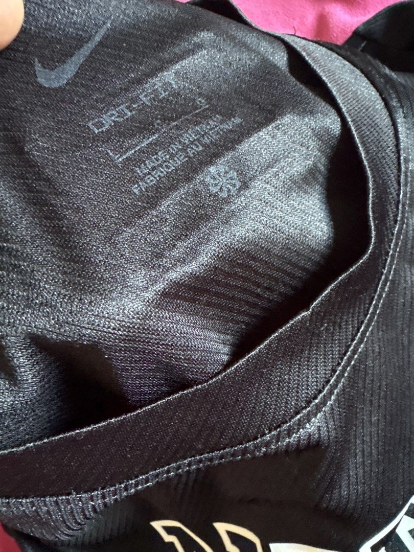 Nike Running Dri-FIT Black Tshirt (Category: Activewear) located in Cainta. Submitted by PreLovedbyANM (Listing ID 1471011556, Image 3). Description: - Brand: Nike - Item: Running T-Shirt - Color: Black - Size: Large - Material: Dri-FIT moisture-wicking fabric - Details: Varsity-style logo on chest, Nike Team patch on back collar, taped interior neck branding - Condition: Great athletic or casual top - Origin: Made in Vietnam No COD No other chec