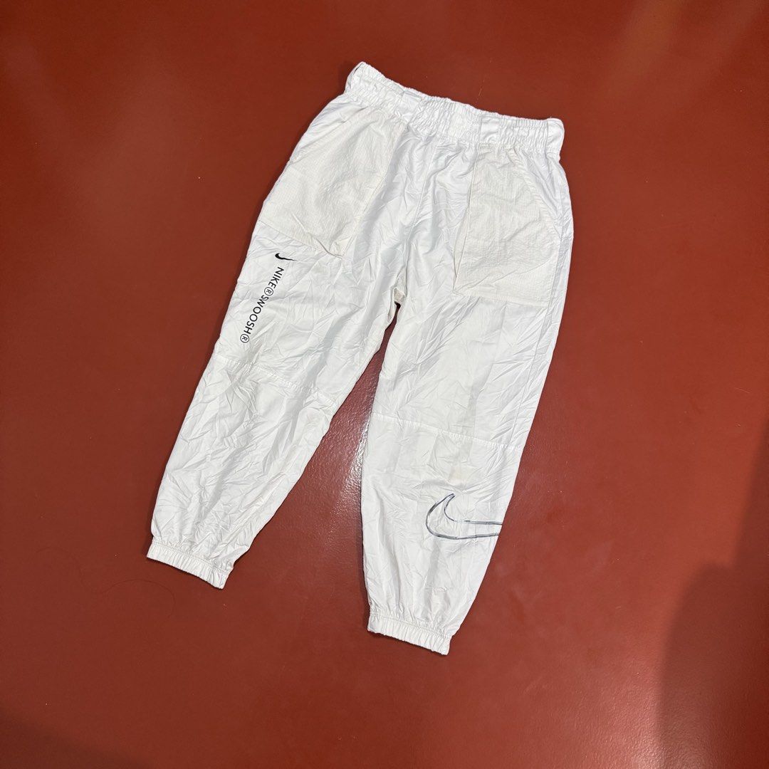 NIKE SWOOSH WOVEN PANTS (Category: Joggers) located in Pasig City. Submitted by buzzthrifty (Listing ID 1471001729, Image 2). Description: SIZE 30-38WAIST 36LENGTH EXCELLENT CONDITION .