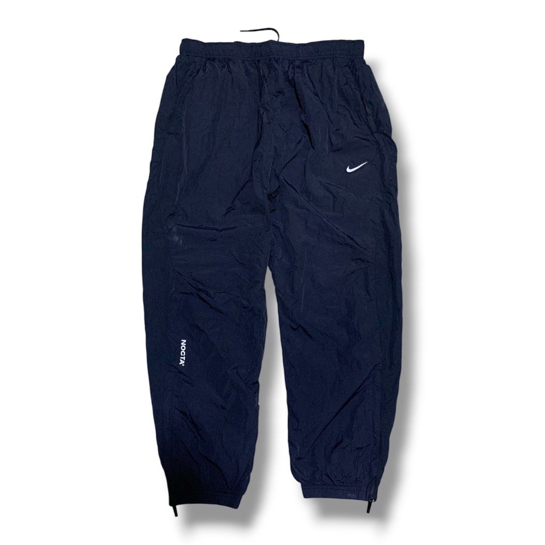 Nike x NOCTA Northstar Nylon Track Pants (Category: Joggers) located in Bula. Submitted by b3nedictpuk_ (Listing ID 1471073565, Image 1). Description: WTS!! Nike x NOCTA Northstar Nylon Track Pants Size: XXL Waist: 29-34 Length: 37 Hem: 5 -1800.
