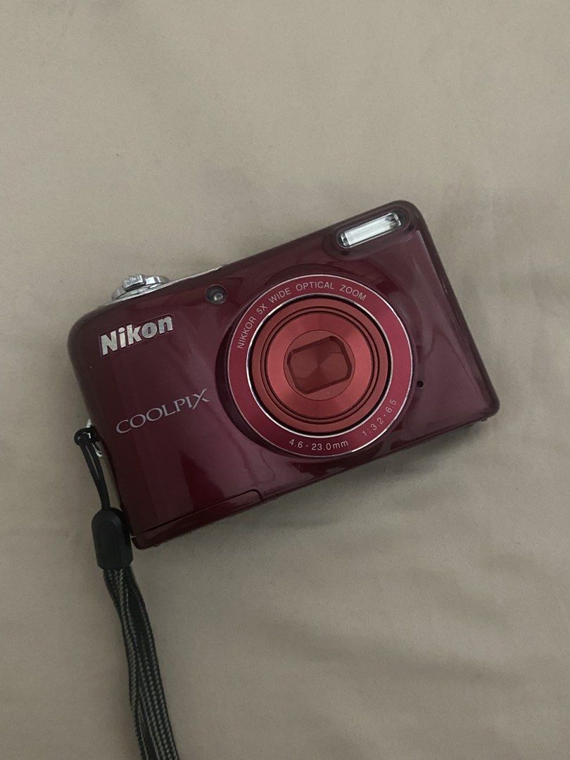 Nikon Coolpix L30 (Category: Cameras) located in Manila. Submitted by rumyewn (Listing ID 1470932224, Image 1). Description: - Model: Red Nikon Coolpix compact digital camera - Condition: Tested, working, minor lcd dust that doesnt affect output inclusions: camera camera pouch original wrist strap batteries sd card.