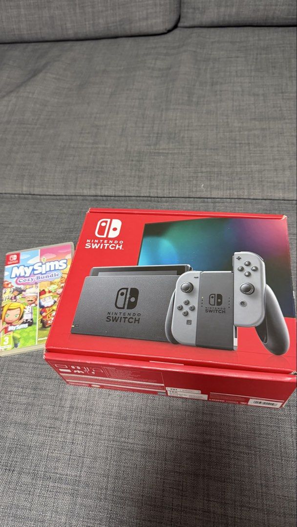 Nintendo Switch 1 with MySims Cozy Bundle Game (Category: Nintendo) located in San Fernando. Submitted by galecatalan (Listing ID 1471056862, Image 1). Description: - Nintendo Switch Console (Gray) with original box - Includes original dock, power adapter, and all accessories - Comes with MySims Cozy Bundle physical game - Complete set, packed securely in the box.